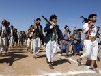 Armed Houthi followers march during a parade in solidarity with the Palestinians in the Gaza Strip and to show support to Houthi strikes on ships in the Red Sea and the Gulf of Aden, in Sanaa, Yemen January 29, 2024. REUTERS/Khaled Abdullah
