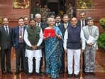Finance minister Nirmala Sitharaman with her team ahead of the presentation of interim budget in Parliament on Thursday. (Sanchit Khanna/HT Photo)