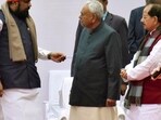 Bihar chief minister Nitish Kumar with deputy chief ministers Samrat Choudhary and Vijay Kumar Sinha during death anniversary function of Mahatma Gandhi at Gandhi Ghat in Patna, Bihar,