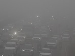 Vehichles ply on the Delhi-Gurugram Expressway amid low visibility due to fog on a cold winter day, in Gurugram on January 31. Vehichles ply on the Delhi-Gurugram Expressway amid low visibility due to fog on a cold winter day, in Gurugram on January 31.