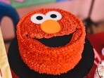 Bakers are having fun with Elmo cakes in various styles, (Shutterstock)