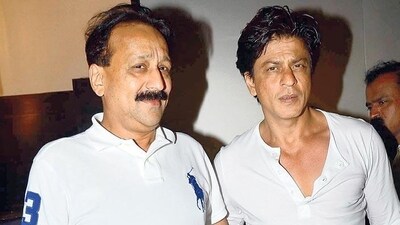 Congress leader Baba Siddique with actor Shah Rukh Khan (File Photo) Congress leader Baba Siddique with actor Shah Rukh Khan (File Photo)