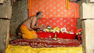 A priest offers prayers at 'Vyas Ji Ki Tehkhana' after the Varanasi court's judgment to allow Hindu devotees to worship inside the sealed basement of the Gyanvapi mosque complex, in Varanasi on Thursday. (ANI) A priest offers prayers at 'Vyas Ji Ki Tehkhana' after the Varanasi court's judgment to allow Hindu devotees to worship inside the sealed basement of the Gyanvapi mosque complex, in Varanasi on Thursday. (ANI)