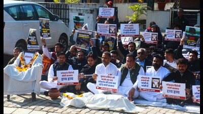 Accusing the presiding officer, Anil Masih, a BJP officer-bearer, of tampering with ballot papers during the election that led to invalidation of eight votes, the protesters held a symbolic funeral procession, terming the BJP’s misconduct in the mayoral polls “death of democracy” in Chandigarh. (Ravi Kumar/HT)
