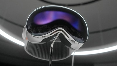 FILE - The Apple Vision Pro headset is displayed in a showroom on the Apple campus after it's unveiling on June 5, 2023. (AP) FILE - The Apple Vision Pro headset is displayed in a showroom on the Apple campus after it's unveiling on June 5, 2023. (AP)
