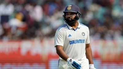 India's Rohit Sharma walks back to the pavilion after losing his wicket, caught out by England's Ollie Pope off the bowling of Shoaib Bashir (REUTERS)