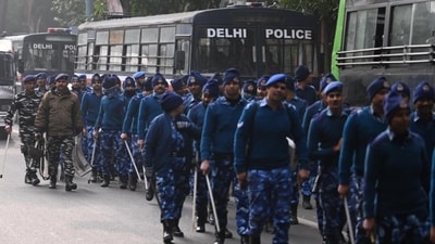 Personnel of the Delhi police and paramilitary forces at DDU marg on Friday. (Raj k Raj/HT)