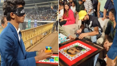 The image shows Mohammed Shami looking at his portrait made using Rubik's Cubes. (Instagram/@masteraffankutty)
