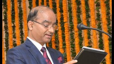 Nand Lal Sharma taking the oath as chairman of the Haryana Electricity Regulatory Commission. (HT Photo)