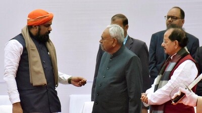 Bihar chief minister Nitish Kumar with deputy chief ministers Samrat Choudhary and Vijay Kumar Sinha during death anniversary function of Mahatma Gandhi at Gandhi Ghat in Patna, Bihar, (Santosh Kumar/Hindustan Times)
