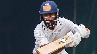 Saurashtra's batter Cheteshwar Pujara plays a shot. (PTI) Saurashtra's batter Cheteshwar Pujara plays a shot. (PTI)