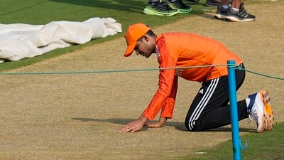 Shubman Gill inspects the Visakhapatnam pitch (PTI)