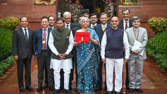 Finance minister Nirmala Sitharaman with her team ahead of the presentation of interim budget in Parliament on Thursday. (Sanchit Khanna/HT Photo)