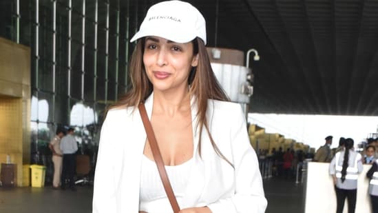 Pick a bag like actor Malaika Arora that will allow you to have all your essentials without you having to dig around in your big bag. (Photo: Yogen Shah)