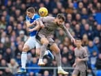 Tottenham's Rodrigo Bentancur, right, jumps for a header with Everton's Dominic Calvert-Lewin during their Premier League match. Tottenham's Rodrigo Bentancur, right, jumps for a header with Everton's Dominic Calvert-Lewin during their Premier League match.