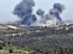Israel-Hamas War: Smoke rises following what the Israeli armed forces say was an air strike on Hezbollah targets at a location given as Lebanon.