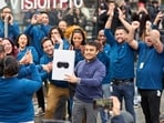 The first Vision Pro customer leaving Apple's flagship Fifth Avenue store with his new device.