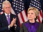 Former President Bill Clinton applauds as his wife, Democratic presidential candidate Hillary Clinton speaks in New York, Wednesday, Nov. 9, 2016, where she conceded her defeat to Republican Donald Trump after the hard-fought presidential election. President Trump and his allies are harking back to his own transition four years ago to make a false argument that his own presidency was denied a fair chance for a clean launch. Press secretary Kayleigh McEnany laid out the case from the White House podium last week and the same idea has been floated by Trump's personal lawyer and his former director of national intelligence. The day after her defeat in 2016, Hillary Clinton conceded. (AP Photo/Matt Rourke)