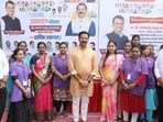 BJP's Kalyan East MLA Ganpat Gaikwad (in centre).