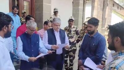 A day after a controversial play based on “Ramleela” staged at Lalit Kala Kedra, BJP Yuva Morcha members allegedly vandalised property and threw black ink at the centre’s walls on Saturday. Members of right-wing group approached SPPU vice-chancellor Suresh Gosavi (second from left) requesting him to take action against people over the objectionable play. (HT) A day after a controversial play based on “Ramleela” staged at Lalit Kala Kedra, BJP Yuva Morcha members allegedly vandalised property and threw black ink at the centre’s walls on Saturday. Members of right-wing group approached SPPU vice-chancellor Suresh Gosavi (second from left) requesting him to take action against people over the objectionable play. (HT)