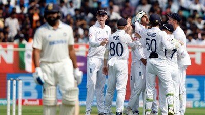 England's Shoaib Bashir celebrates after taking the wicket of India's Rohit Sharma, caught out by Ollie Pope (REUTERS)