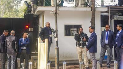 Delhi Police crime branch sleuths outside chief minister Arvind Kejriwal’s residence (PTI Photo) Delhi Police crime branch sleuths outside chief minister Arvind Kejriwal’s residence (PTI Photo)