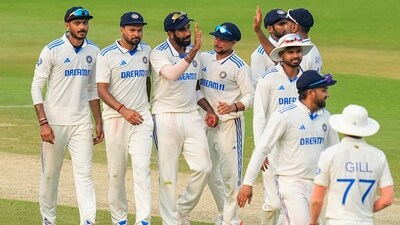 India's bowler Jasprit Bumrah with teammates, who took 6 wickets, at the end of the first innings of England during the second day of the second Test cricket match between India and England, at Dr. Y.S. Rajasekhara Reddy ACA-VDCA Cricket Stadium (PTI) India's bowler Jasprit Bumrah with teammates, who took 6 wickets, at the end of the first innings of England during the second day of the second Test cricket match between India and England, at Dr. Y.S. Rajasekhara Reddy ACA-VDCA Cricket Stadium (PTI)