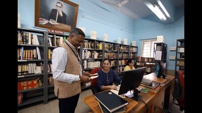 Prasad Joshi, professor and general editor of Sanskrit Dictionary Project, at work with a researcher at the Department of Sanskrit and Lexicography, Deccan College, Pune. (Rahul Raut/ ht photo) Prasad Joshi, professor and general editor of Sanskrit Dictionary Project, at work with a researcher at the Department of Sanskrit and Lexicography, Deccan College, Pune. (Rahul Raut/ ht photo)