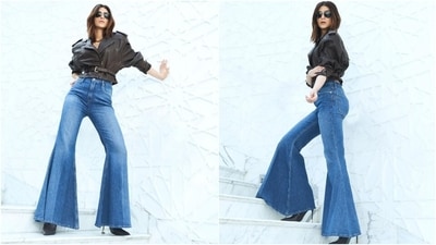Celebrity stylist Sukriti Grover shared Kriti's first look on Instagram with the caption, "@kritisanon bringing back the 70's! #CaliforniaEthos." The pictures show her embracing retro style with a touch of modern glam in an outfit from the clothing label Frame. She wore a cropped brown leather jacket featuring notch lapel collars, full-length sleeves, a belt to cinch the waist, and textured details. (Instagram) Celebrity stylist Sukriti Grover shared Kriti's first look on Instagram with the caption, "@kritisanon bringing back the 70's! #CaliforniaEthos." The pictures show her embracing retro style with a touch of modern glam in an outfit from the clothing label Frame. She wore a cropped brown leather jacket featuring notch lapel collars, full-length sleeves, a belt to cinch the waist, and textured details. (Instagram)