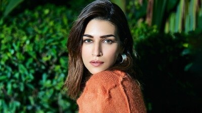 Kriti chose black pumps, rings and silver hoop earrings for the accessories. Lastly, side-parted open locks, darkened brows, smoky eye shadow, mascara on the lashes, mauve lip shade, rouge on the cheekbones, and a dewy base rounded off the glam picks. (Instagram) Kriti chose black pumps, rings and silver hoop earrings for the accessories. Lastly, side-parted open locks, darkened brows, smoky eye shadow, mascara on the lashes, mauve lip shade, rouge on the cheekbones, and a dewy base rounded off the glam picks. (Instagram)