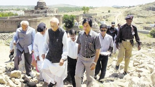 During the Pakistan trip in 2005, LK Advani, then BJP president and leader of the opposition, is seen at the Katas Raj temple near Lahore. Pakistani foreign minister Khurshid Kasuri had invited Advani to visit the country. (PTI) During the Pakistan trip in 2005, LK Advani, then BJP president and leader of the opposition, is seen at the Katas Raj temple near Lahore. Pakistani foreign minister Khurshid Kasuri had invited Advani to visit the country. (PTI)