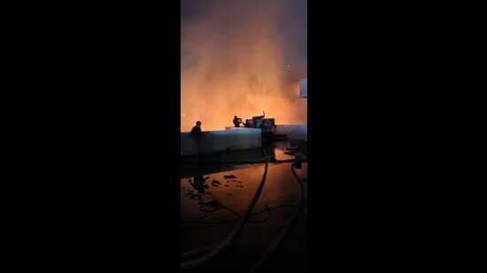 A suspected short-circuit led to a major fire at two plywood showrooms in Sector 82, JLPL, Mohali, in the wee hours on Saturday. Firefighters rushed to plot numbers 727 and 728 in the area after being alerted at 3 am. (HT Photo)