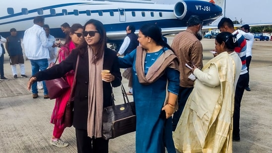Ranchi: MLAs of the JMM-led alliance at the Birsa Munda Airport as they leave for Hyderabad. (PTI)