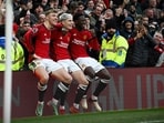 Manchester United's Argentinian midfielder Alejandro Garnacho (C) celebrates after scoring his team second goal. Manchester United's Argentinian midfielder Alejandro Garnacho (C) celebrates after scoring his team second goal.