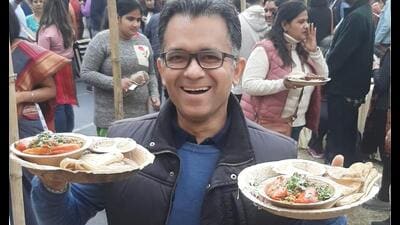 A foodie in possession of much-in-demand Lalmirch Keema prepared by Noor Khan at the ongoing Sanatkada Festival. (Deep Saxena/HT) A foodie in possession of much-in-demand Lalmirch Keema prepared by Noor Khan at the ongoing Sanatkada Festival. (Deep Saxena/HT)