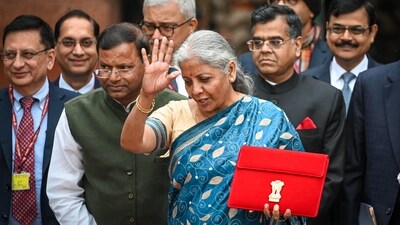 New Delhi, India - Feb. 1, 2024: Nirmala Sitharaman, Union Minister of Finance along with Bhagwat Karad and Pankaj Chaudhary MOS Finance leaves the Finance Ministry carrying the Finance Budget ahead of the presentation of interim Budget 2024 in Parliament at North Block in New Delhi, India, on Thursday, February 1, 2024. (Photo by Sanchit Khanna/ Hindustan Times) (Hindustan Times) New Delhi, India - Feb. 1, 2024: Nirmala Sitharaman, Union Minister of Finance along with Bhagwat Karad and Pankaj Chaudhary MOS Finance leaves the Finance Ministry carrying the Finance Budget ahead of the presentation of interim Budget 2024 in Parliament at North Block in New Delhi, India, on Thursday, February 1, 2024. (Photo by Sanchit Khanna/ Hindustan Times) (Hindustan Times)