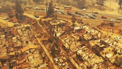 Aerial view of burned houses after a forest fire that affected the hills in Quilpe, Viña del Mar, Chile. (AFP) Aerial view of burned houses after a forest fire that affected the hills in Quilpe, Viña del Mar, Chile. (AFP)