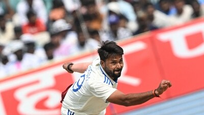 India's Mukesh Kumar delivers a ball during the second day of the second Test cricket match between India and England at the Y.S. Rajasekhara Reddy cricket stadium in Visakhapatnam (AFP) India's Mukesh Kumar delivers a ball during the second day of the second Test cricket match between India and England at the Y.S. Rajasekhara Reddy cricket stadium in Visakhapatnam (AFP)