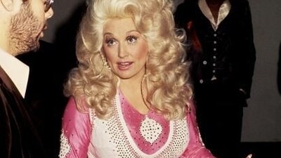 Dolly Parton, 1977: Her outfit at the 1977 Grammys was a striking ensemble that showcased her signature style. She wore a glamorous, form-fitting gown adorned with shimmering sequins and intricate detailing. (Pinterest) Dolly Parton, 1977: Her outfit at the 1977 Grammys was a striking ensemble that showcased her signature style. She wore a glamorous, form-fitting gown adorned with shimmering sequins and intricate detailing. (Pinterest)