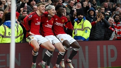 Manchester United's Argentinian midfielder Alejandro Garnacho (C) celebrates after scoring his team second goal. (AFP) Manchester United's Argentinian midfielder Alejandro Garnacho (C) celebrates after scoring his team second goal. (AFP)
