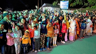 People stand to welcome PM Modi on his arrival in Guwahati. The PM landed at the Lokpriya Gopinath Bordoloi International Airport here from Odisha around 6.30 pm and proceeded to Koinadhara State Guest House. (PTI) People stand to welcome PM Modi on his arrival in Guwahati. The PM landed at the Lokpriya Gopinath Bordoloi International Airport here from Odisha around 6.30 pm and proceeded to Koinadhara State Guest House. (PTI)