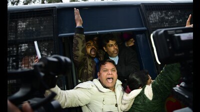 Police taking away AAP leaders who started a relay hunger strike outside the MC office in Chandigarh on Sunday. (Sanjeev Sharma/HT) Police taking away AAP leaders who started a relay hunger strike outside the MC office in Chandigarh on Sunday. (Sanjeev Sharma/HT)