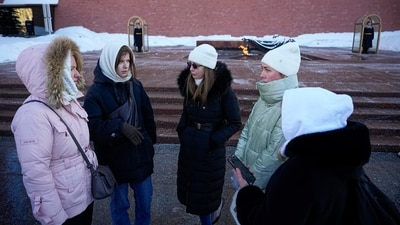 Wives of Russian soldiers mobilized for fighting in Ukraine talk to each other after laying flowers at the Unknown Soldier's Tomb at the Kremlin wall in Moscow, Russia. (AP/File) Wives of Russian soldiers mobilized for fighting in Ukraine talk to each other after laying flowers at the Unknown Soldier's Tomb at the Kremlin wall in Moscow, Russia. (AP/File)