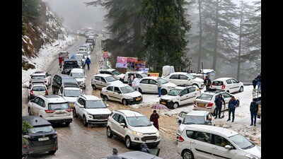 Vehicles stuck in traffic jam at Kufri after snowfall in Shimla on Sunday. (PTI) Vehicles stuck in traffic jam at Kufri after snowfall in Shimla on Sunday. (PTI)