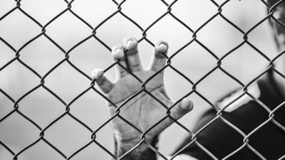 The man climbed down the prison wall using knotted bed sheets. (Representational Image/Unsplash) The man climbed down the prison wall using knotted bed sheets. (Representational Image/Unsplash)