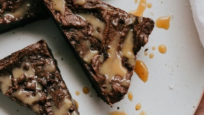 Nutella Brownies: Incorporate Nutella into your brownie batter for a fudgy and chocolatey treat. Swirl Nutella on top of the batter before baking for a marbled effect. (Unsplash) Nutella Brownies: Incorporate Nutella into your brownie batter for a fudgy and chocolatey treat. Swirl Nutella on top of the batter before baking for a marbled effect. (Unsplash)
