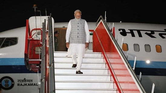 Prime Minister Narendra Modi on Saturday reached Guwahati on a two-day trip, during which he will unveil development projects worth nearly <span class='webrupee'>₹</span>11,600 crore.&nbsp;(CMO Assam X)