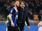Inter Milan coach Simone Inzaghi and Marko Arnautovic celebrate after the match 