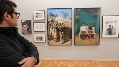 A visitor looks at immersive photographer Gauri Gill’s works at the Vadehra Art Gallery booth. Gill’s practice is guided exhaustive enquiries into rural, marginalised and indigenous communities in India. ( Paroma Mukherjee/ Hindustan Times) A visitor looks at immersive photographer Gauri Gill’s works at the Vadehra Art Gallery booth. Gill’s practice is guided exhaustive enquiries into rural, marginalised and indigenous communities in India. ( Paroma Mukherjee/ Hindustan Times)