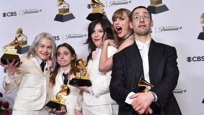 Phoebe Bridgers, from left, Julien Baker, and Lucy Dacus of boygenius pose in the press room with the awards for best rock performance and best rock song for Not Strong Enough, and best alternative music album for The Record. Taylor Swift, center right, and Jack Antonoff pose with the award for record of the year for Midnights during the 66th annual Grammy Awards. (AP) Phoebe Bridgers, from left, Julien Baker, and Lucy Dacus of boygenius pose in the press room with the awards for best rock performance and best rock song for Not Strong Enough, and best alternative music album for The Record. Taylor Swift, center right, and Jack Antonoff pose with the award for record of the year for Midnights during the 66th annual Grammy Awards. (AP)